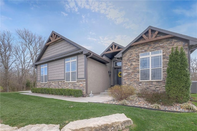 craftsman-style home with a front lawn