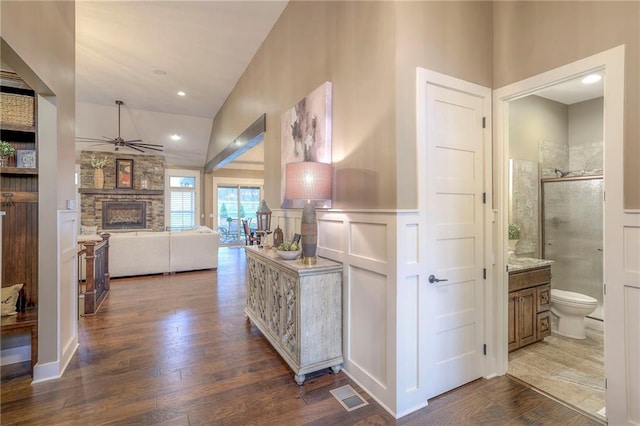 hall with dark wood-type flooring