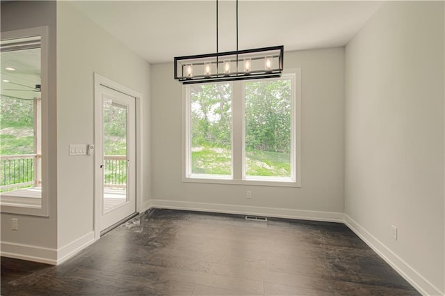 16615 NW 124th St, Platte City, MO 64079 - unfurnished dining area featuring dark wood-style floors and a chandelier