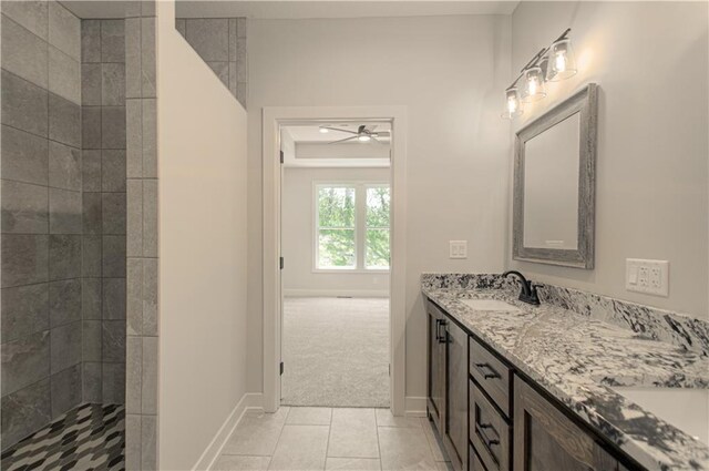 16615 NW 124th St, Platte City, MO 64079 - full bath with double vanity, a ceiling fan, tile patterned floors, and walk in shower