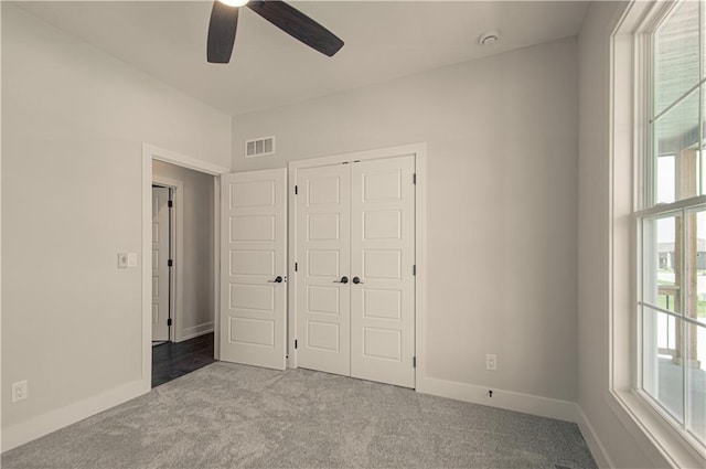 16615 NW 124th St, Platte City, MO 64079 - unfurnished bedroom featuring carpet flooring, a closet, and ceiling fan
