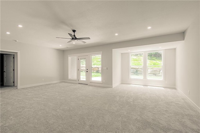 16615 NW 124th St, Platte City, MO 64079 - unfurnished room with light colored carpet, recessed lighting, healthy amount of natural light, and a ceiling fan