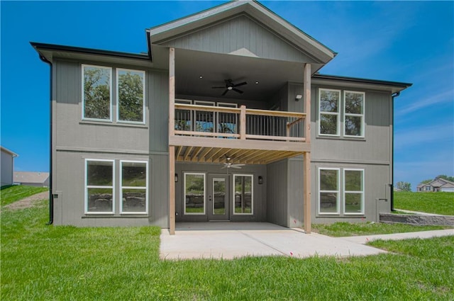 16615 NW 124th St, Platte City, MO 64079 - rear view of property featuring a balcony, a ceiling fan, and a lawn