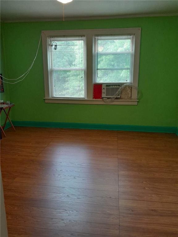 empty room featuring hardwood / wood-style flooring