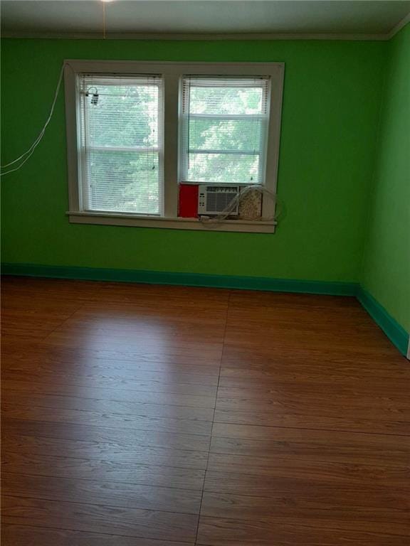 empty room featuring dark wood-type flooring