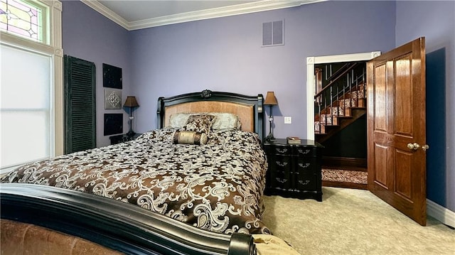 bedroom featuring carpet floors and ornamental molding