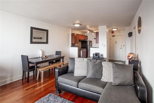 living room with dark wood-type flooring