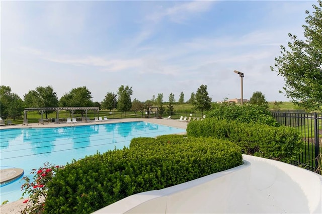 view of swimming pool with a patio area