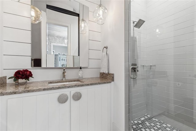 bathroom with vanity and walk in shower