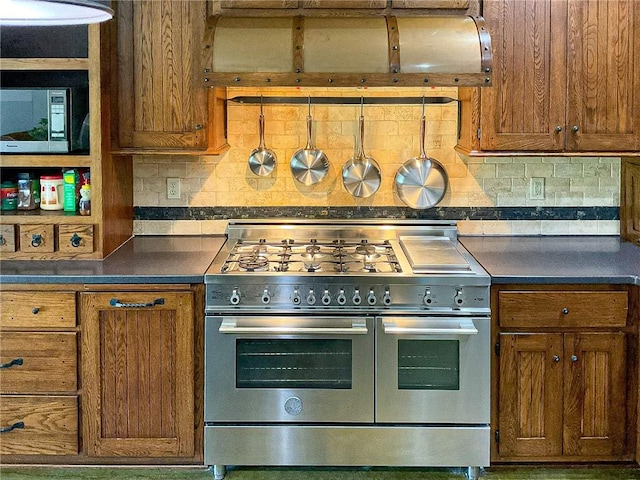 kitchen featuring decorative backsplash and stainless steel appliances