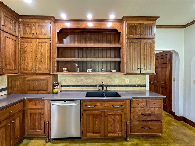 kitchen with stainless steel dishwasher, decorative backsplash, crown molding, and sink