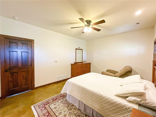 bedroom with ceiling fan and light colored carpet