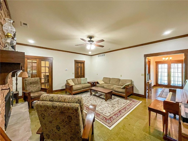 living room with ceiling fan, a stone fireplace, ornamental molding, and french doors