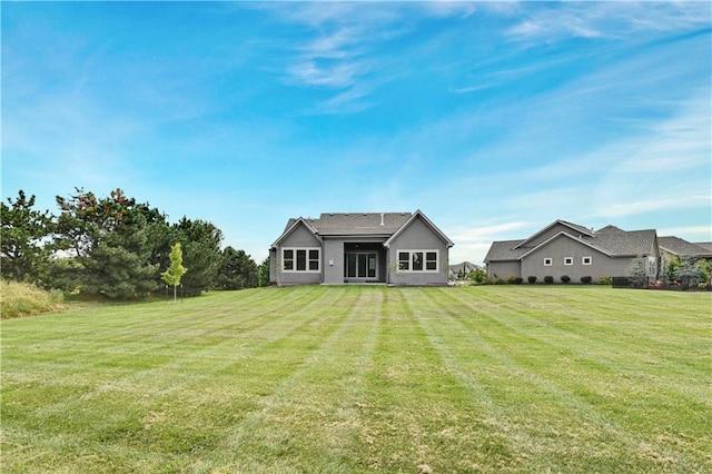 14500 Meadow Ln, Leawood, KS 66224 - back of house featuring a yard