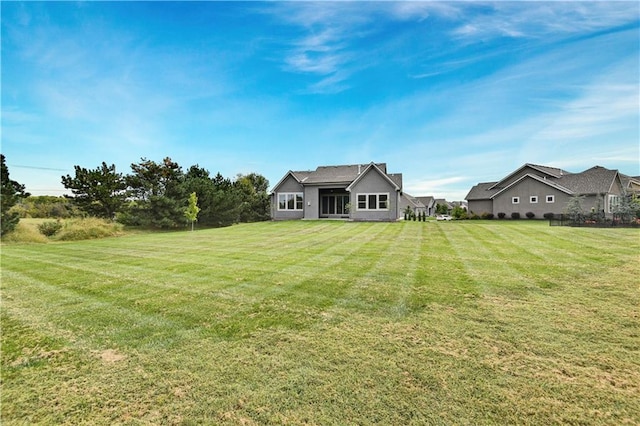 14500 Meadow Ln, Leawood, KS 66224 - back of property featuring a lawn