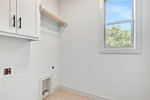 14500 Meadow Ln, Leawood, KS 66224 - clothes washing area featuring cabinet space, baseboards, electric dryer hookup, and plenty of natural light