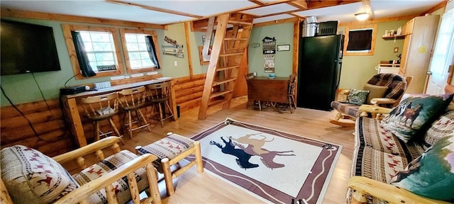 living room with light hardwood / wood-style floors