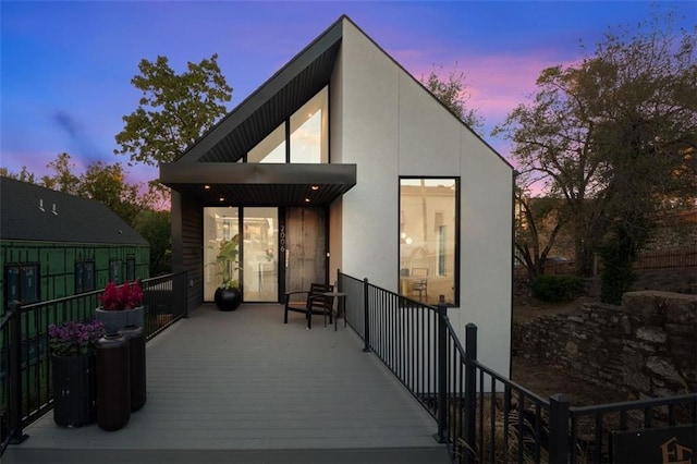 exterior space featuring a wooden deck