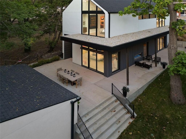 rear view of house featuring a patio area