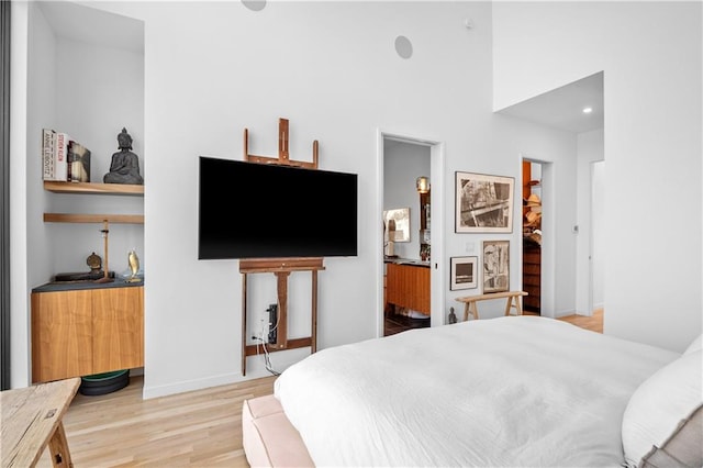 bedroom with light hardwood / wood-style flooring