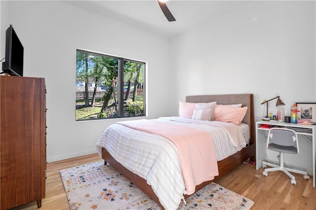 bedroom featuring ceiling fan and light hardwood / wood-style floors