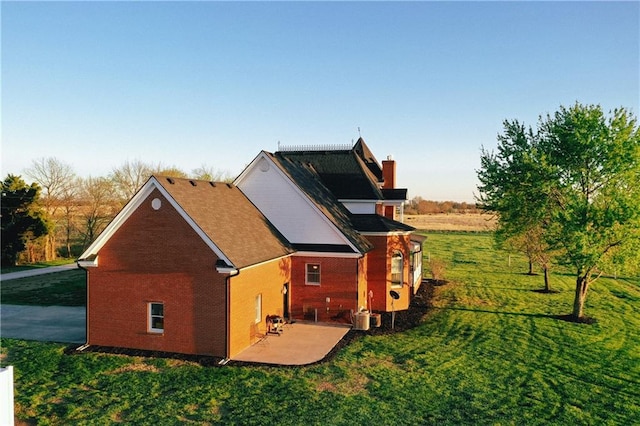 view of outdoor structure with central AC