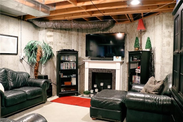 living room featuring concrete flooring