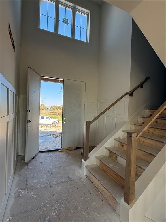 entrance foyer with a towering ceiling