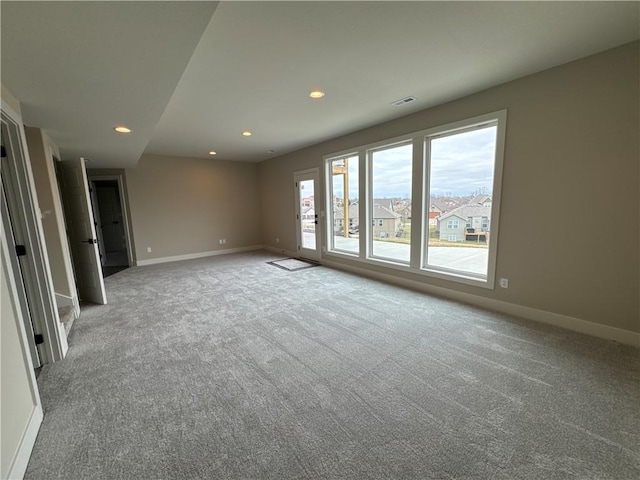 unfurnished room with carpet floors