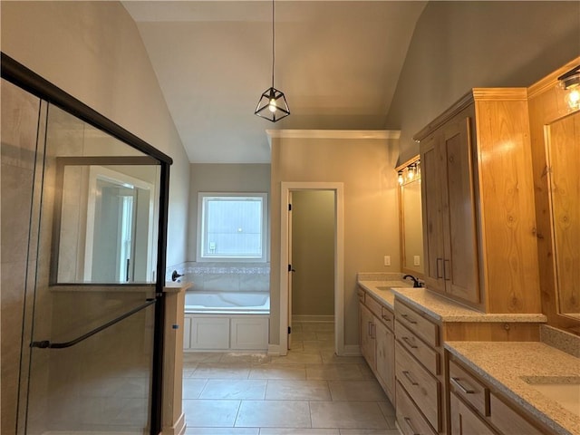 bathroom with vanity, vaulted ceiling, tile patterned floors, and independent shower and bath