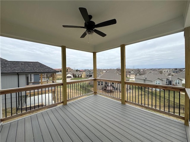 wooden deck with ceiling fan