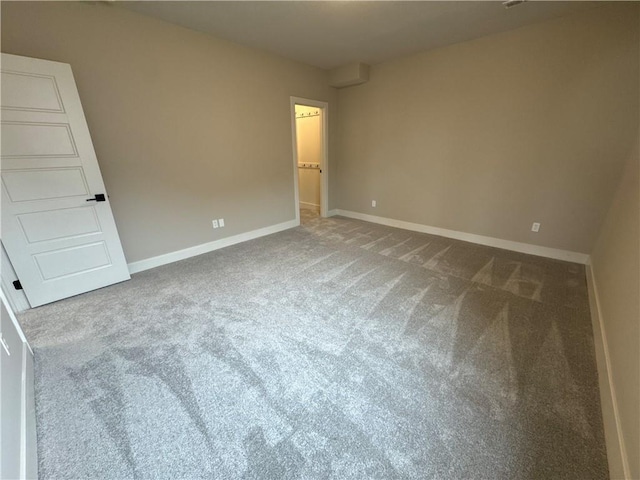 unfurnished bedroom featuring carpet flooring