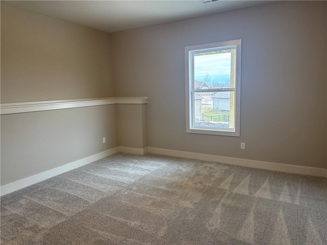 view of carpeted spare room