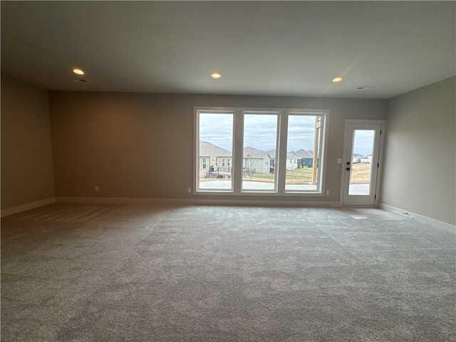 view of carpeted spare room