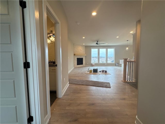 hallway with wood-type flooring