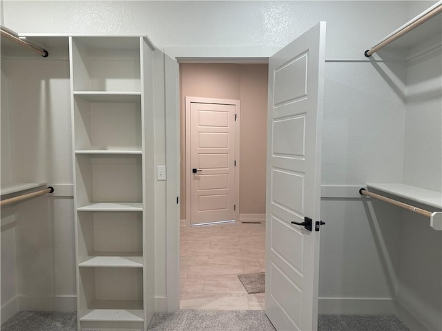 view of walk in closet