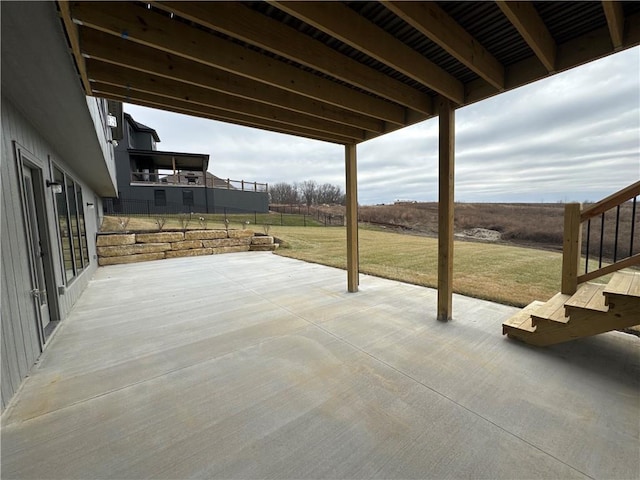 view of patio / terrace with a rural view