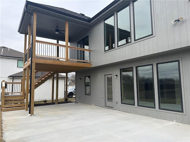 back of house with a patio, a wooden deck, and ceiling fan