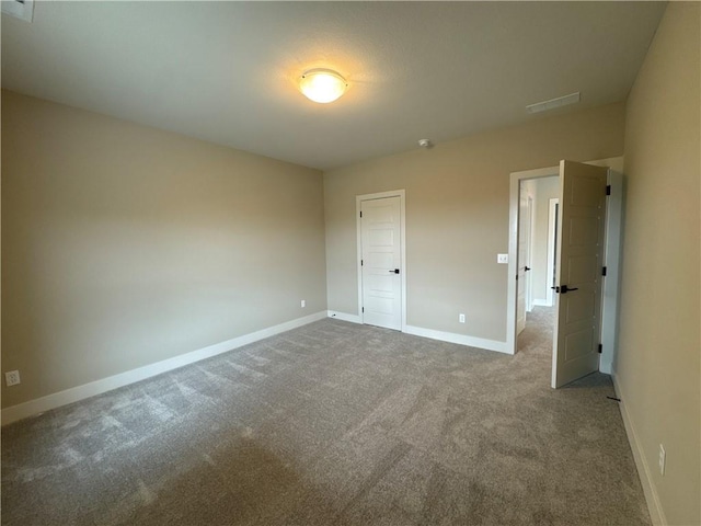 unfurnished bedroom with carpet