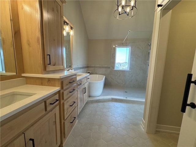 bathroom with vaulted ceiling, tile walls, vanity, independent shower and bath, and tile patterned flooring