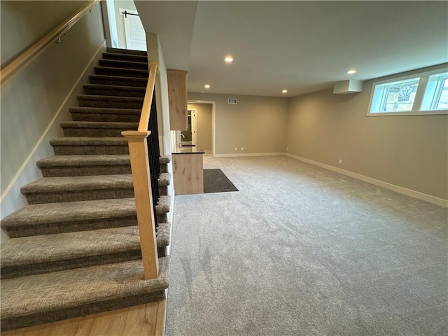 interior space featuring carpet flooring