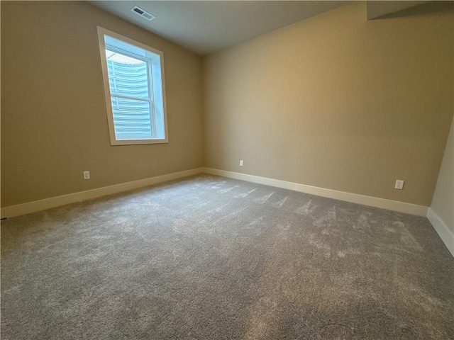 unfurnished room with carpet floors