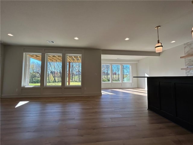 empty room featuring dark hardwood / wood-style floors