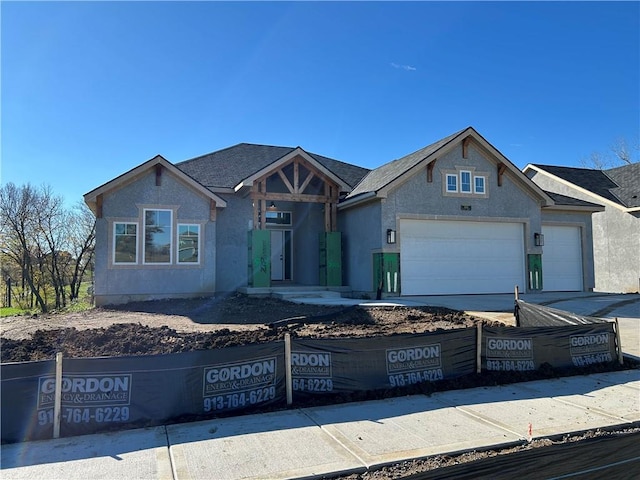 view of front of home with a garage