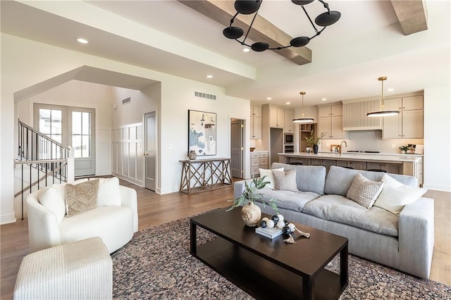 living room with dark hardwood / wood-style floors