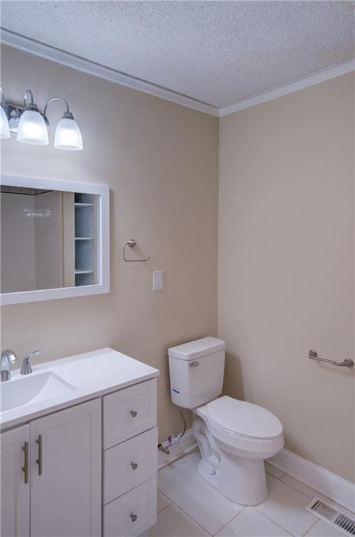 bathroom featuring toilet, tile floors, a textured ceiling, and vanity