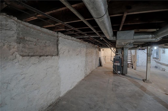 basement featuring heating utilities