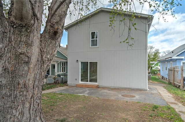 back of property featuring a patio