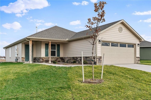 single story home featuring a garage and a front lawn