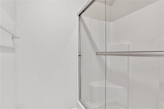 bathroom with an enclosed shower